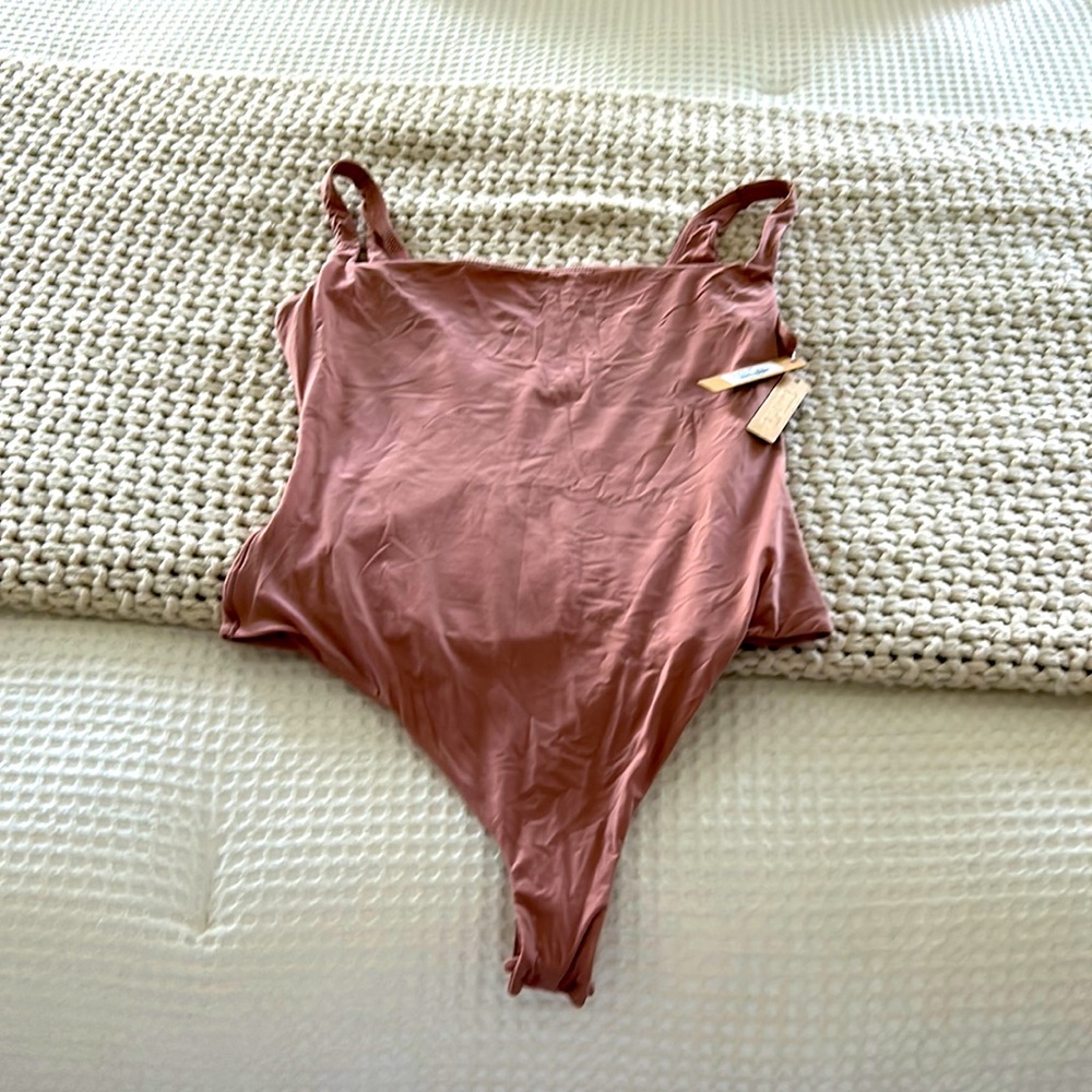 Brand new with tags skims size medium body suit